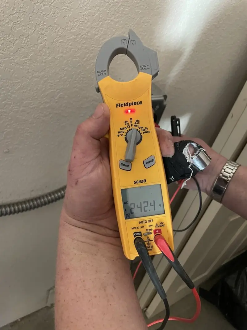 Voltage testing with clamp meter during Ceiling Fan Installation in LaGrange